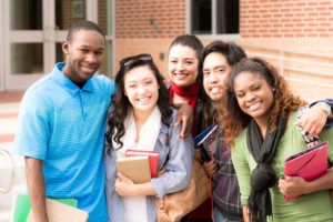 5 Teens in Group Smiling